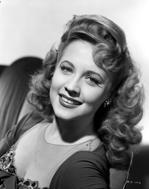 Ann Jeffreys sitting and smiling Photo Print
