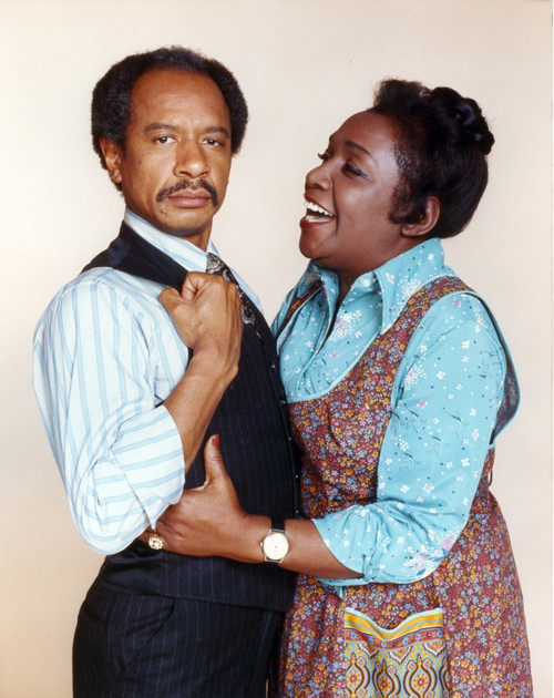 Jeffersons Man in Black Vest Suit with Stripe Long Sleeves and Woman in Blue Long Sleeves and Brown Apron Dress Photo Print - Item # VARCEL700570