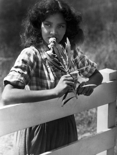 Jennifer Jones on Checkered Top Leaning Photo Print - Item # VARCEL700614