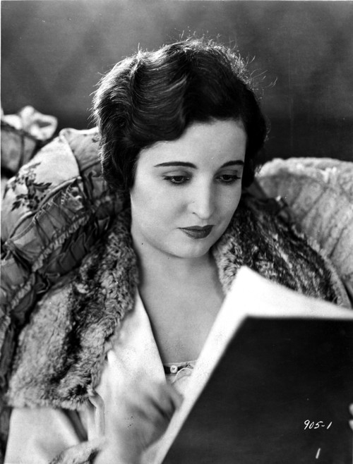 Alice Joyce sitting and Reading Photo Print - Item # VARCEL700686