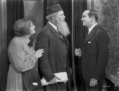 Al Jolson Talking to an Old Couple in a Classic Movie Scene Photo Print - Item # VARCEL700718