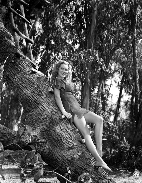 Marsha Jones standing on a Tree Photo Print - Item # VARCEL700695
