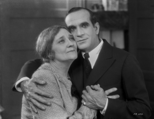 Al Jolson hugging an Old Woman in a Classic Movie Scene Photo Print - Item # VARCEL700739