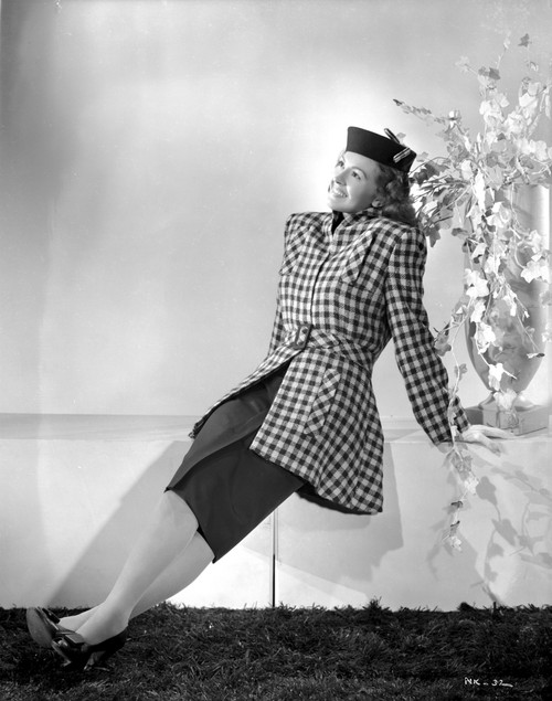 Nancy Kelly on a Checkered Dress sitting Photo Print - Item # VARCEL700802