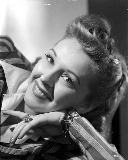 Nancy Kelly on Stripe Long Sleeves with Hand on Chin Photo Print - Item # VARCEL700799