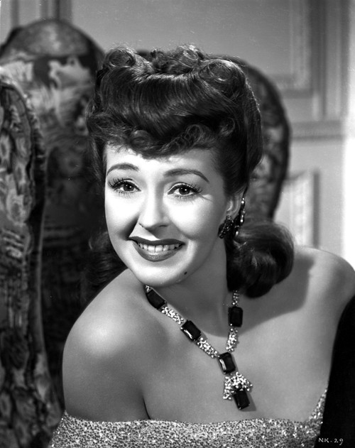 Nancy Kelly on an Off Shoulder Dress and smiling Photo Print - Item # VARCEL700811