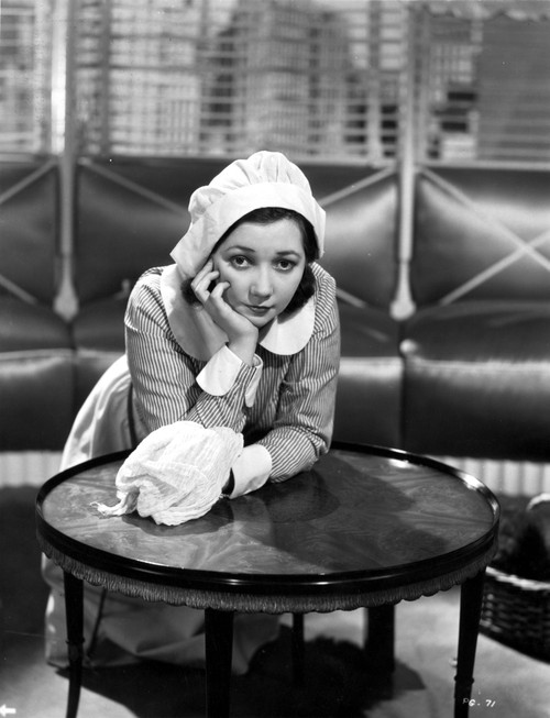 Patsy Kelly on Maid Attire with Face Leaning on Hand Photo Print - Item # VARCEL700847