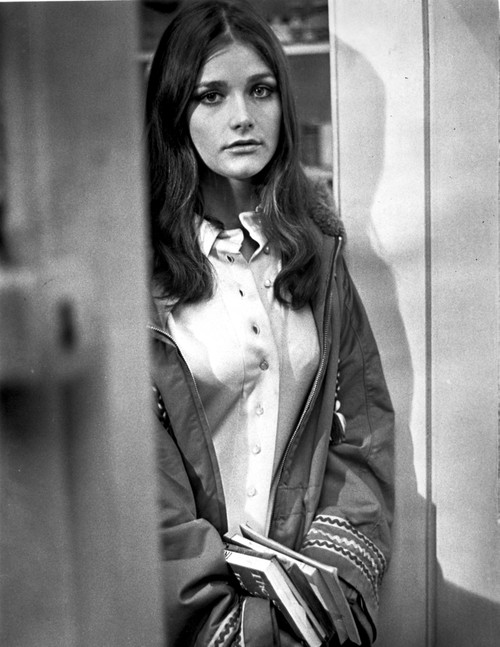 A Portrait Of Margot Kidder Carrying Books Photo Print - Item # VARCEL700992