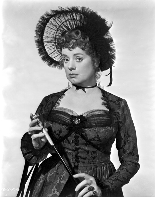 Elsa Lancaster on a Lace Dress and Holding a Stick Photo Print - Item # VARCEL701027