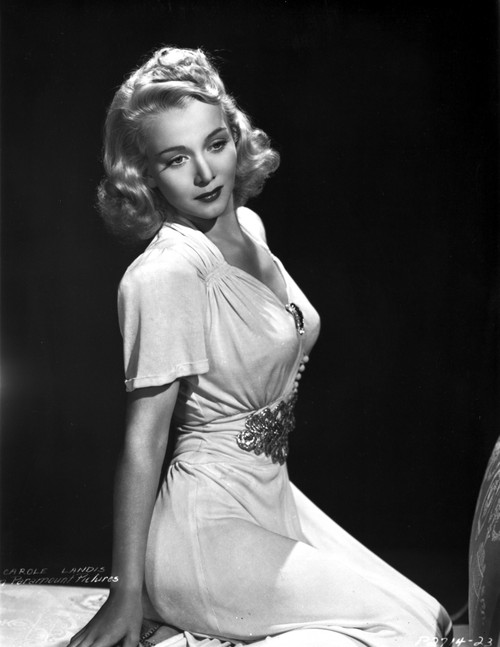 Carole Landis on a Dress sitting and Reclining Photo Print - Item # VARCEL701079