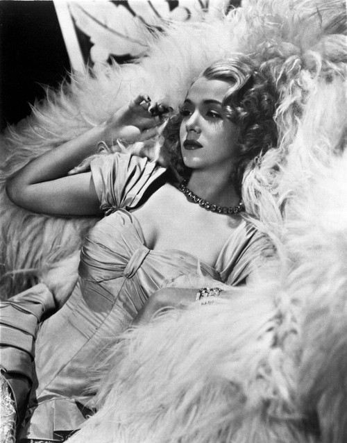 Carole Landis Lying on a Furry Cloth Photo Print - Item # VARCEL701136