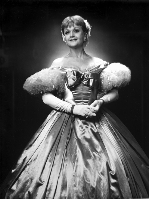 Angela Lansbury standing and wearing a Glossy Dress Photo Print - Item # VARCEL701232