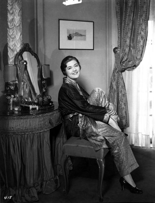 Laura La Plante sitting and smiling Photo Print - Item # VARCEL701278