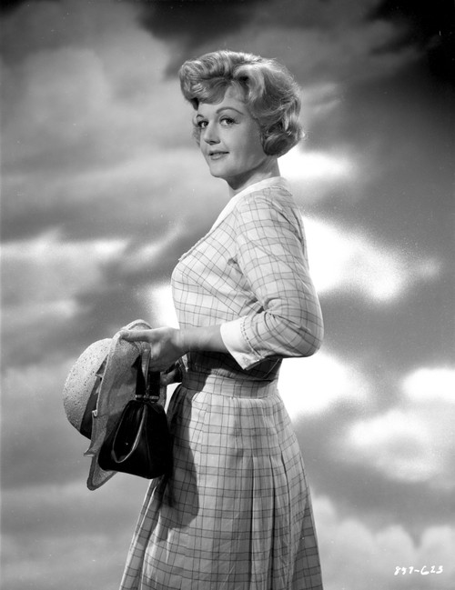 Angela Lansbury Looking Away wearing a Checkered Dress Holding a Hat Photo Print - Item # VARCEL701256