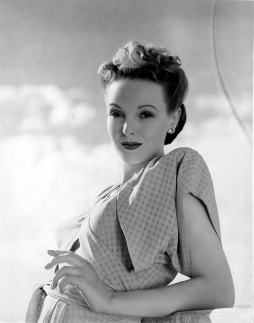 Anna Lee on Printed Dress Leaning and smiling Photo Print - Item # VARCEL701303