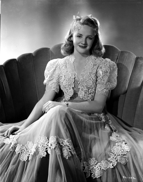 Dona Lee on an Embroidered Top sitting in Black and White Photo Print - Item # VARCEL701330