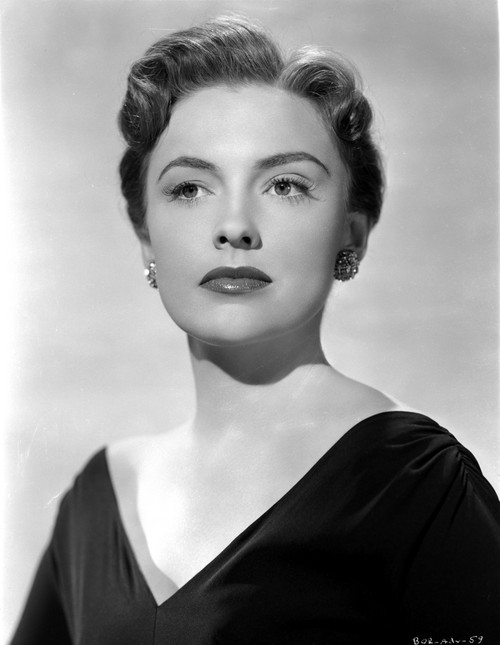 Joan Leslie Showing a Serious Face, wearing a Black V-Neck Dress in Portrait Photo Print - Item # VARCEL701397
