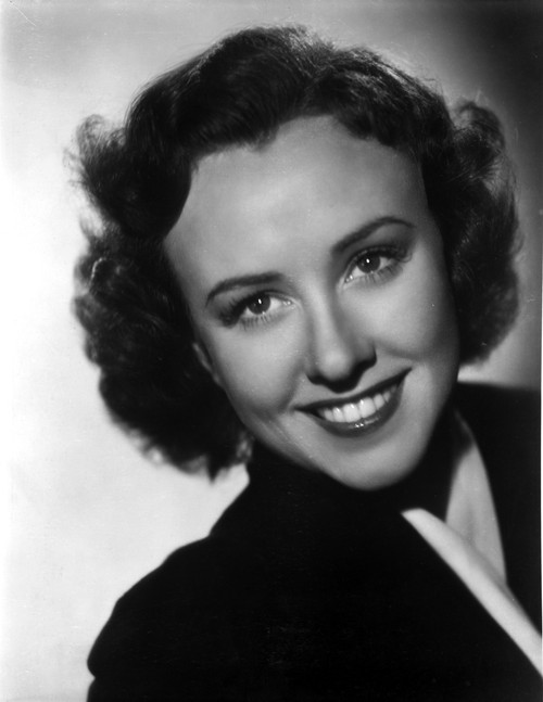 Margaret Lindsey in Black Close Up Portrait with a Smile Photo Print - Item # VARCEL701430