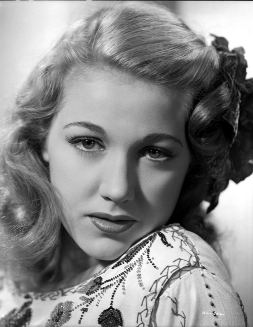 Audrey Long on an Embroidered Top with Ribbon on Head Portrait Photo Print - Item # VARCEL701479