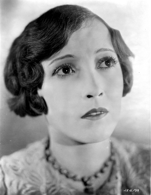 Bessie Love on a Printed Top Looking Up Photo Print - Item # VARCEL701522