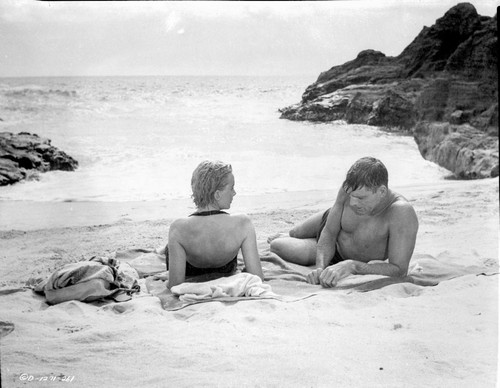 From Here To Eternity Couple Lying in Sand in Black and White Photo Print - Item # VARCEL701525