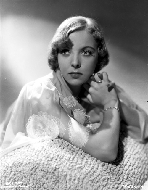 Ida Lupino Leaning on a Soft Cloth and Hands are Holding Photo Print - Item # VARCEL701556