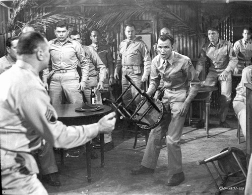 From Here To Eternity Man Carrying a Chair Surrounded By Policemen Photo Print - Item # VARCEL701563