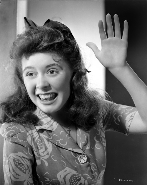 Marcy McGuire on a Printed Top and Hand on Air while smiling Photo Print - Item # VARCEL701645