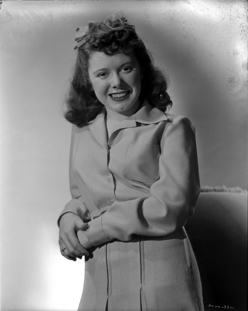 Marcy McGuire on a Long Sleeve Top Leaning and smiling Photo Print - Item # VARCEL701647