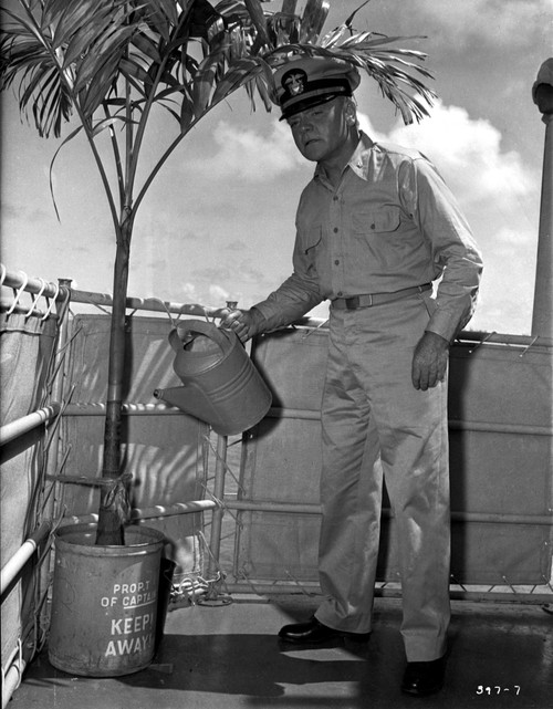 Mister Roberts A Man Holding Water Can Photo Print - Item # VARCEL701671