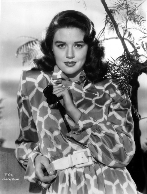 Dorothy Malone on a Printed Dress posed and Slightly smiling Photo Print - Item # VARCEL701701