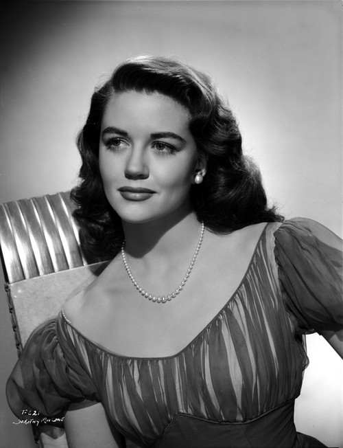 Dorothy Malone on a Lace Dress posed and Slightly smiling Photo Print - Item # VARCEL701703