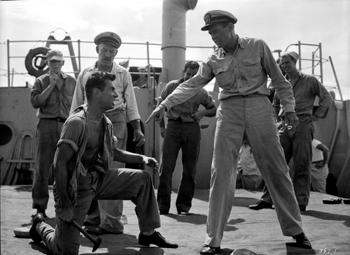 Mister Roberts Man Kneeling around Sailors Photo Print - Item # VARCEL701687