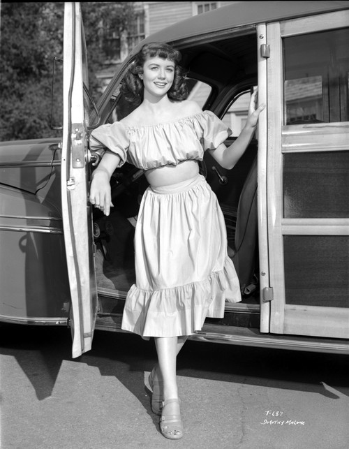 Dorothy Malone on Ruffled Dress smiling and posed Photo Print - Item # VARCEL701727