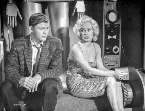 Sex Kittens Go To College Mamie Van Doren sitting with a Man in Suit Photo Print - Item # VARCEL701728