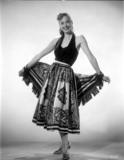Adele Mara on a Printed Skirt posed and smiling Photo Print - Item # VARCEL701767
