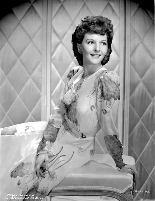 Mary Martin on an Embroidered Dress smiling and sitting Photo Print - Item # VARCEL701897