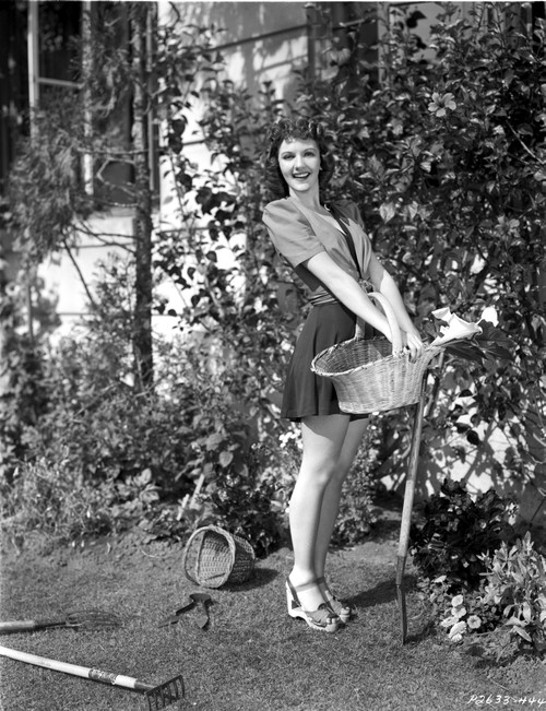 Mary Martin Holding a Basket and smiling Photo Print - Item # VARCEL701932