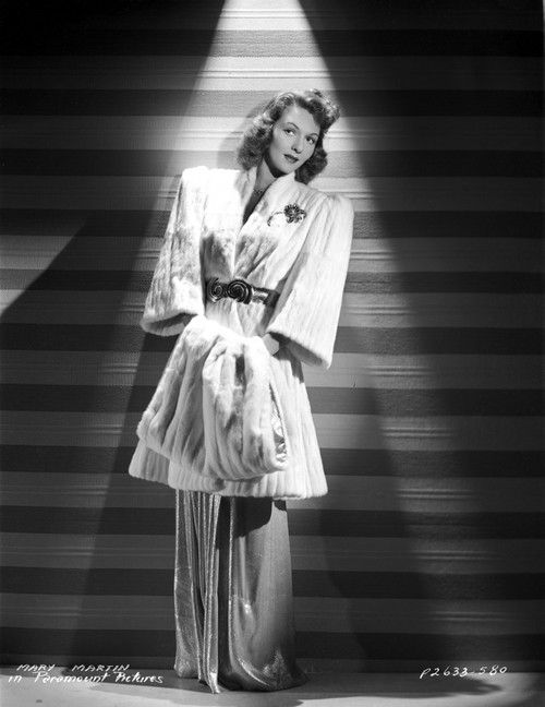Mary Martin on a Coat standing and Leaning Photo Print - Item # VARCEL701956