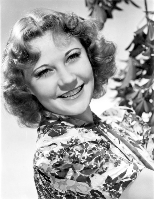 Una Merkel on an Printed Top and smiling Portrait Photo Print - Item # VARCEL702079
