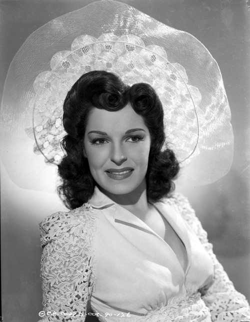 Joan Merrill wearing a White Hat in Portrait Photo Print - Item # VARCEL702100