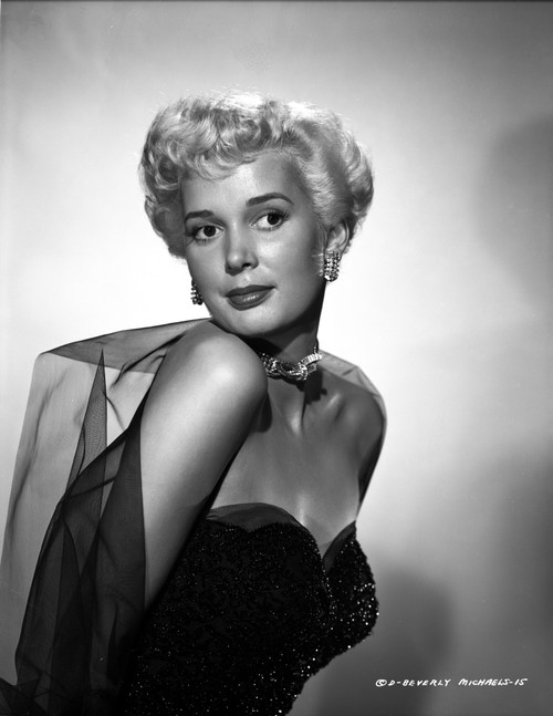 Beverly Michaels on a Tube and Leaning Forward Portrait Photo Print - Item # VARCEL702105
