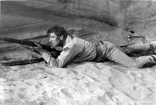 Professionals Man Holding a Gun on the Floor Photo Print - Item # VARCEL702108