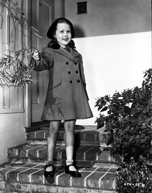 Sharyn Moffett on a Coat and smiling Photo Print - Item # VARCEL702153