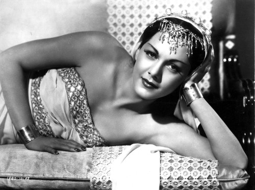 Maria Montez Lying in White Strapless Dress with Headdress Photo Print - Item # VARCEL702212