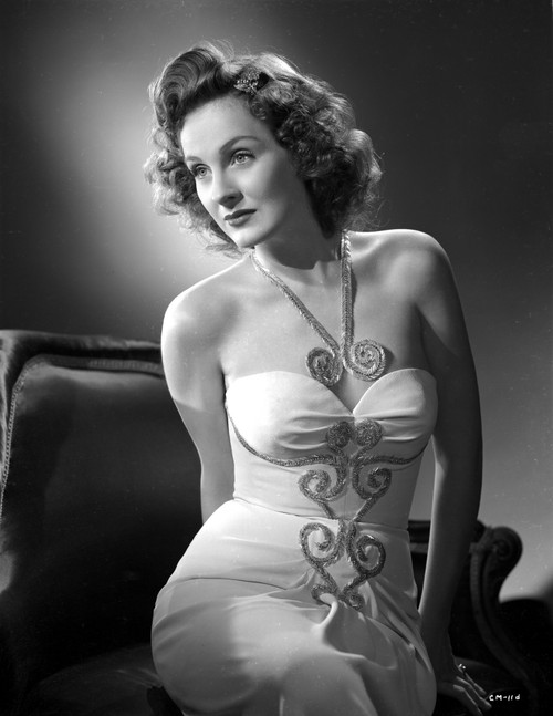 Constance Moore on a Tube Dress sitting and Bending Photo Print - Item # VARCEL702281