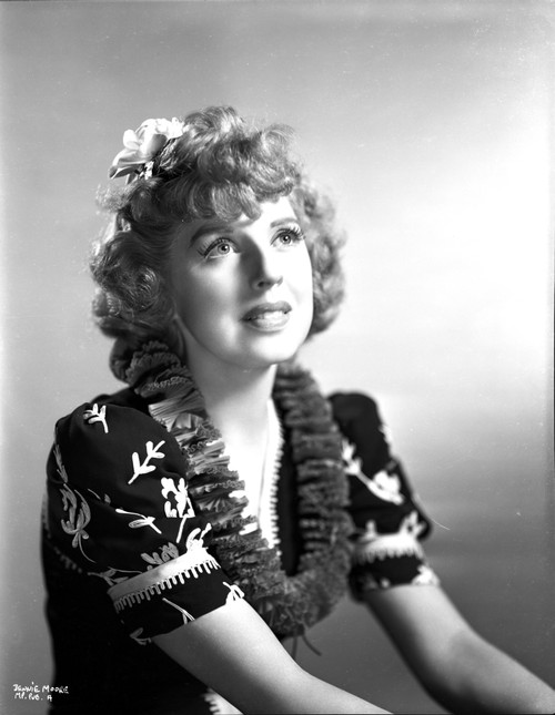 Dennie Moore on a Printed Top and Looking Up Portrait Photo Print - Item # VARCEL702285