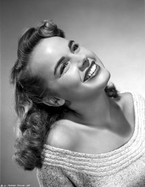 Terry Moore Looking Up and smiling Portrait Photo Print - Item # VARCEL702325