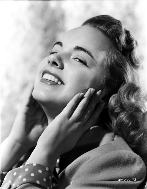 Terry Moore Hands on Face and smiling Portrait Photo Print - Item # VARCEL702342