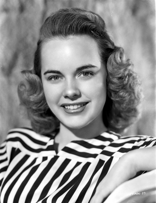 Terry Moore on a Stripe Top and smiling Photo Print - Item # VARCEL702344
